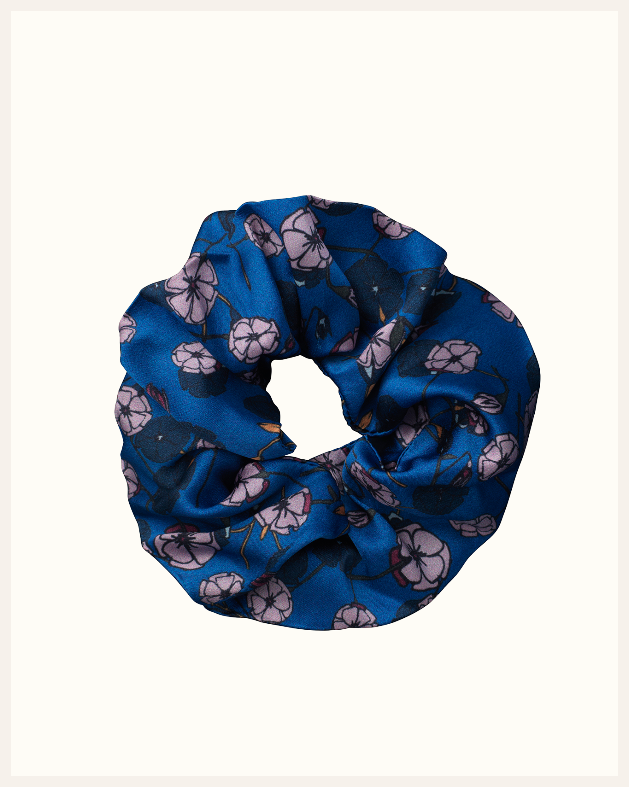 The Beauty Sleeper 100% Mulberry silk hair scrunchie in Gemini Blue — reduces friction and protects hair overnight