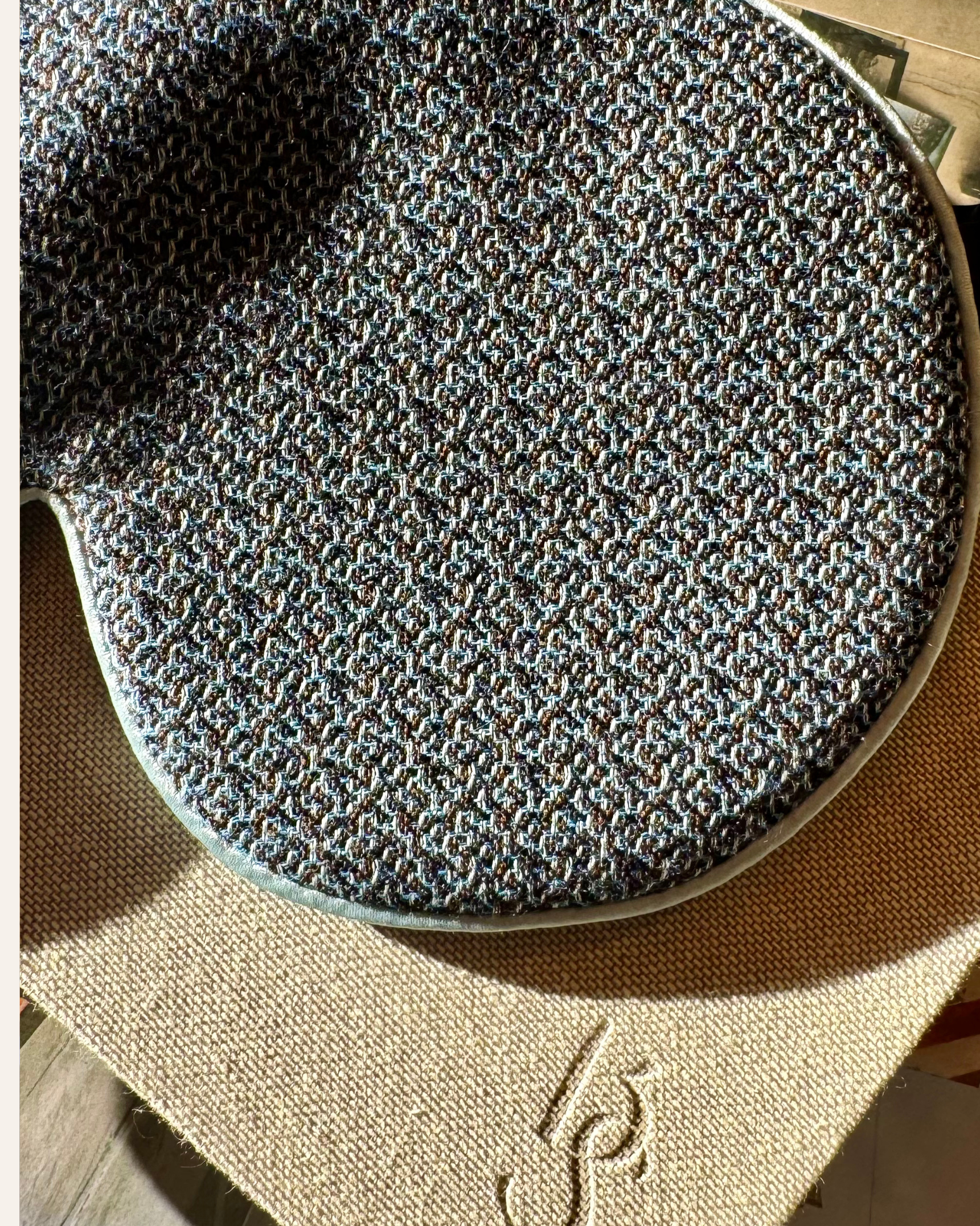 The Beauty Sleeper Kapsaliana silk sleep mask — handmade from surplus Italian wool tweed, lined with Mulberry silk