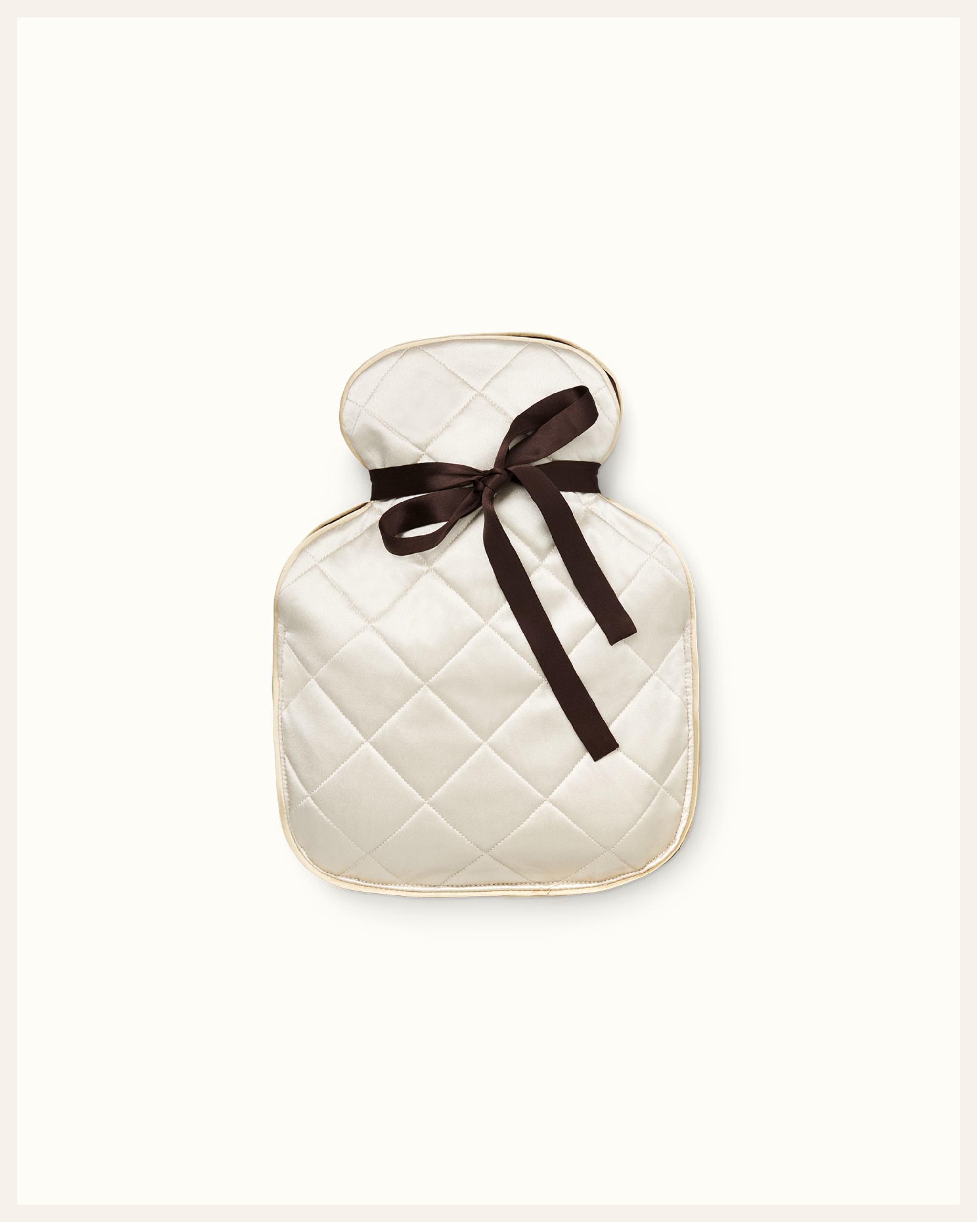 The Beauty Sleeper Wild Chamomile small silk hot water bottle — travel-friendly natural warmth