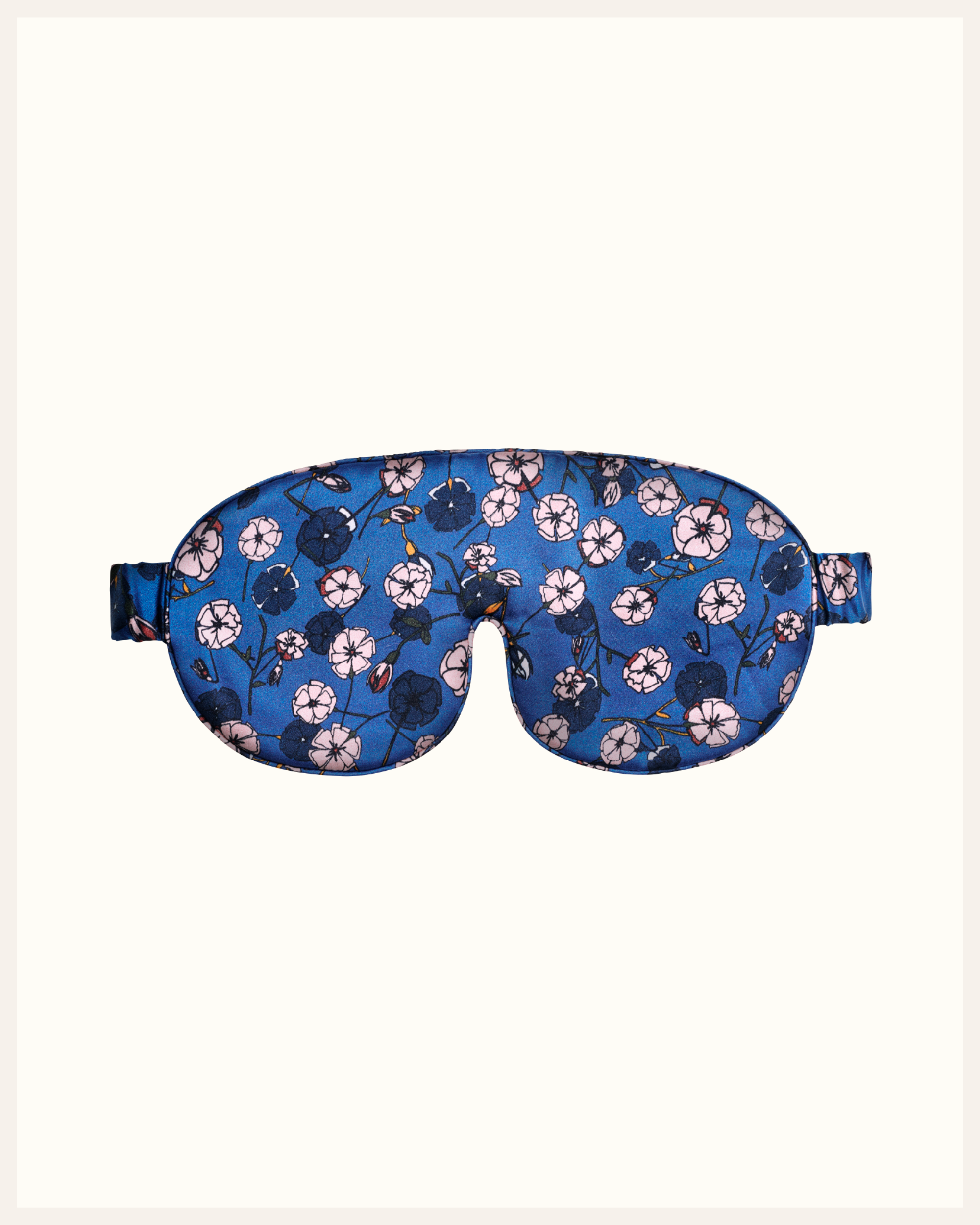 The Beauty Sleeper 100% Mulberry silk sleep mask in Gemini Blue — blocks light for deep, restorative sleep