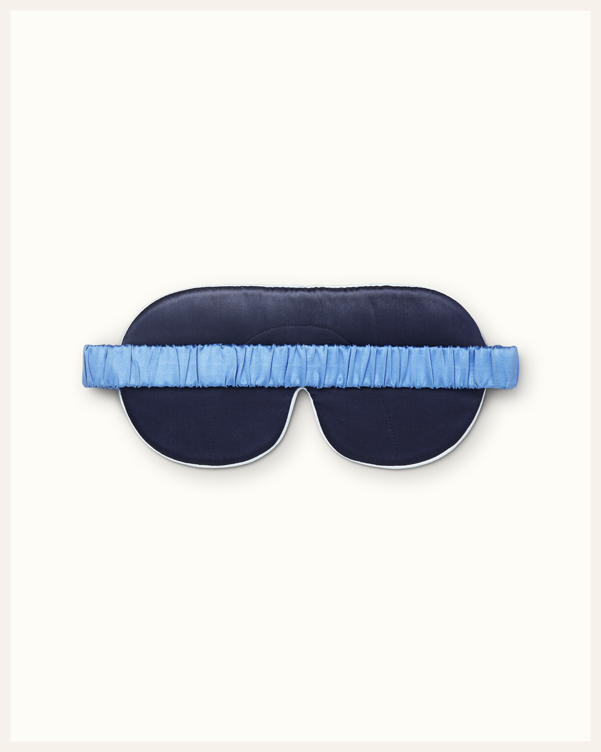 The Beauty Sleeper Sandy Beach silk sleep mask back view — wide silk strap protects hair overnight