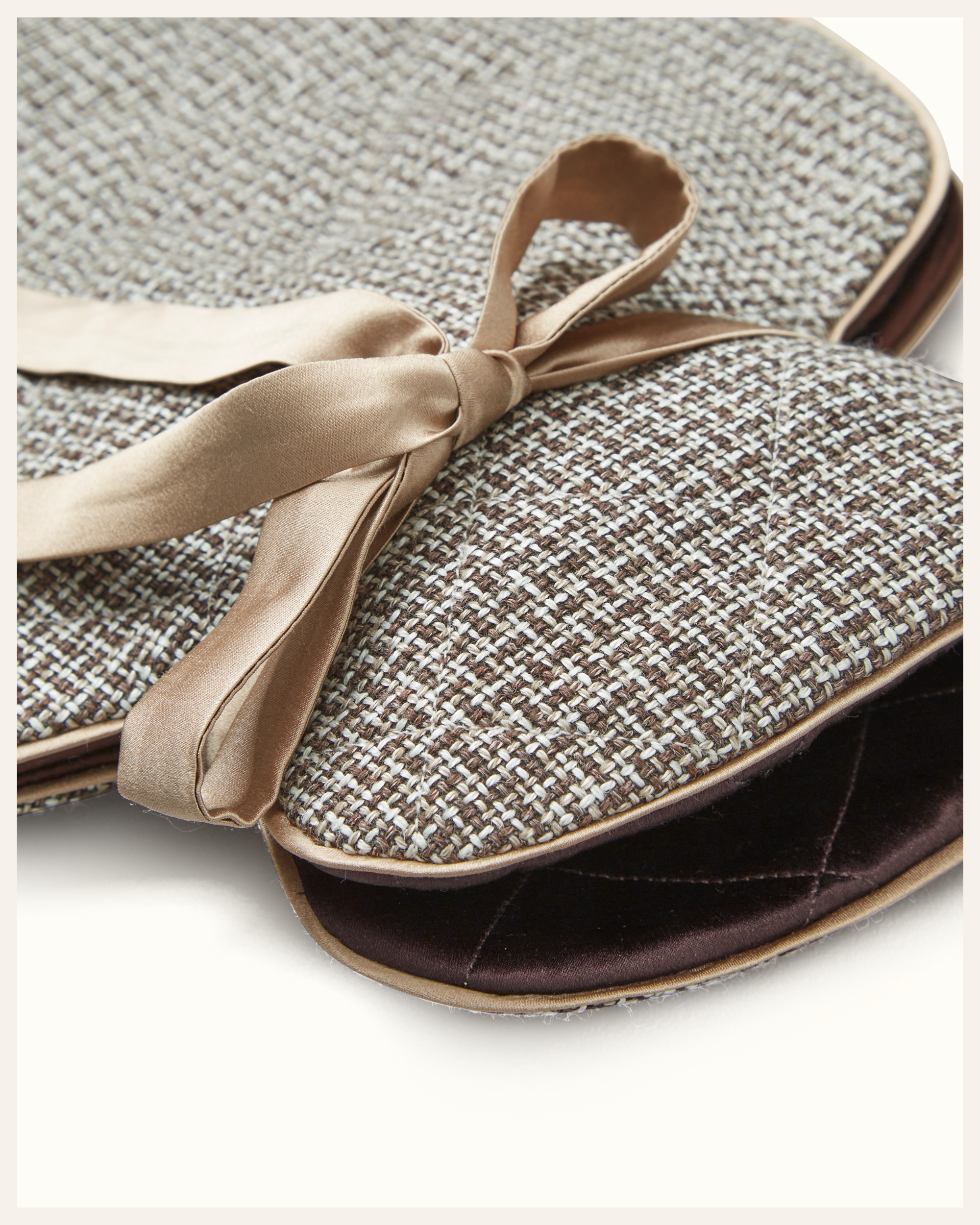 The Beauty Sleeper Cap Ferrat small hot water bottle — travel-sized surplus Italian wool tweed, natural warmth on the go