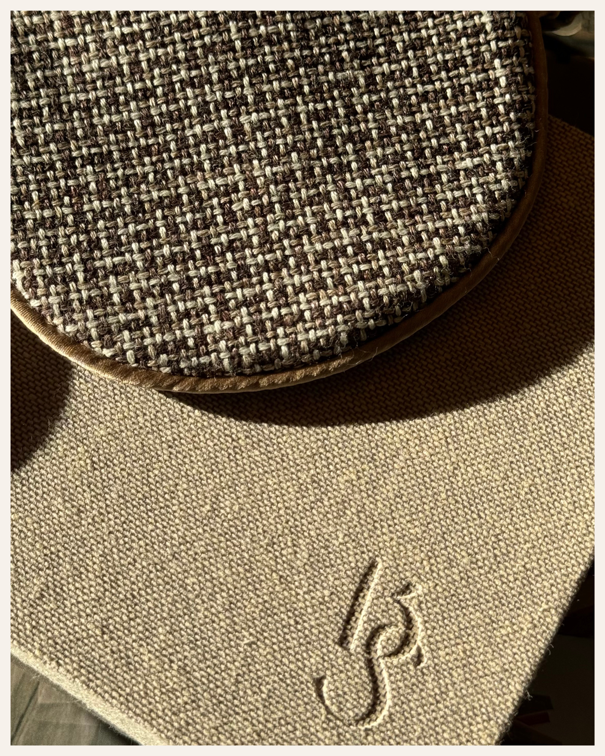 The Beauty Sleeper Cap Ferrat silk sleep mask — handmade from surplus Italian wool tweed, lined with Mulberry silk