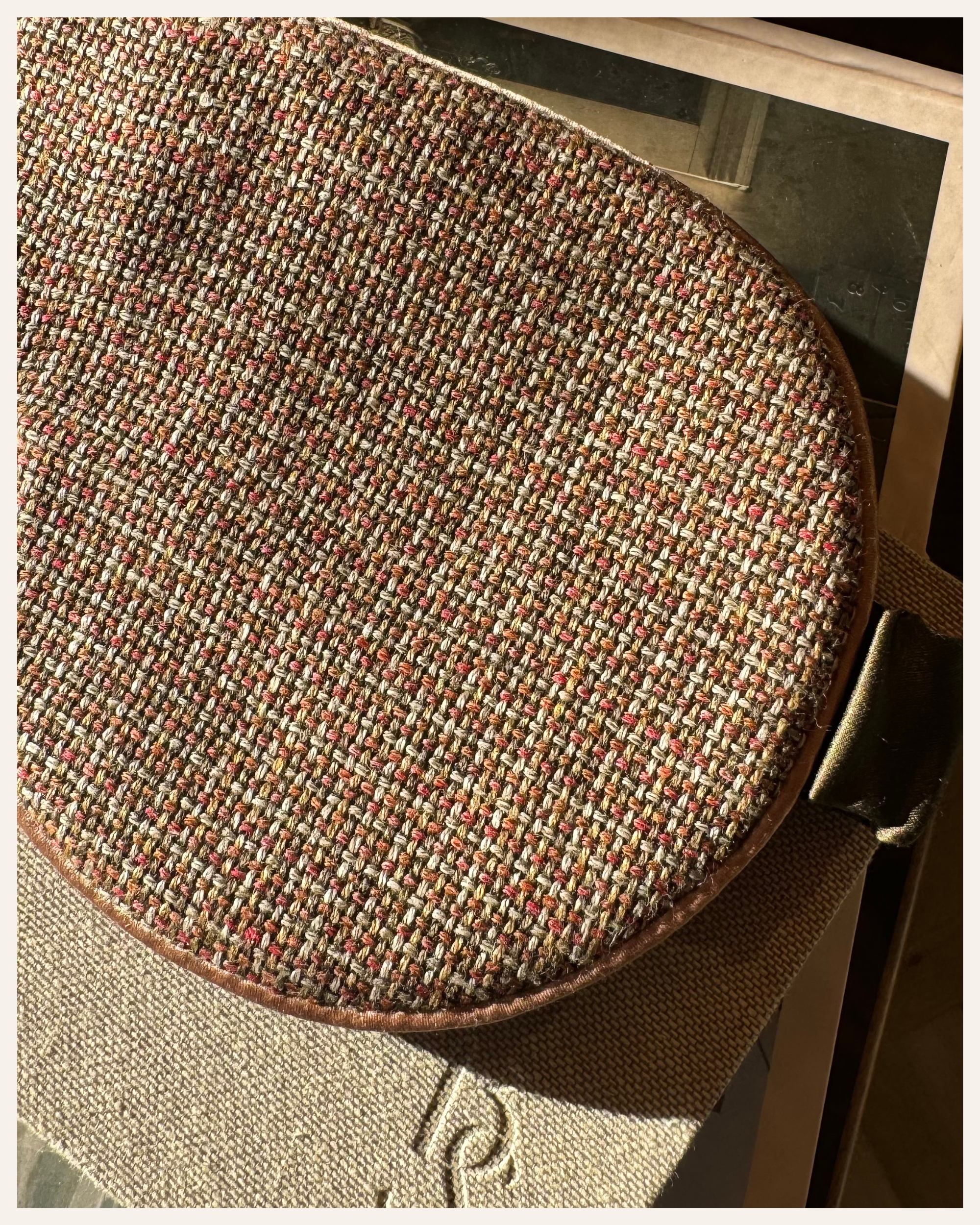 The Beauty Sleeper Stow silk sleep mask — handmade from surplus Italian wool tweed, lined with Mulberry silk