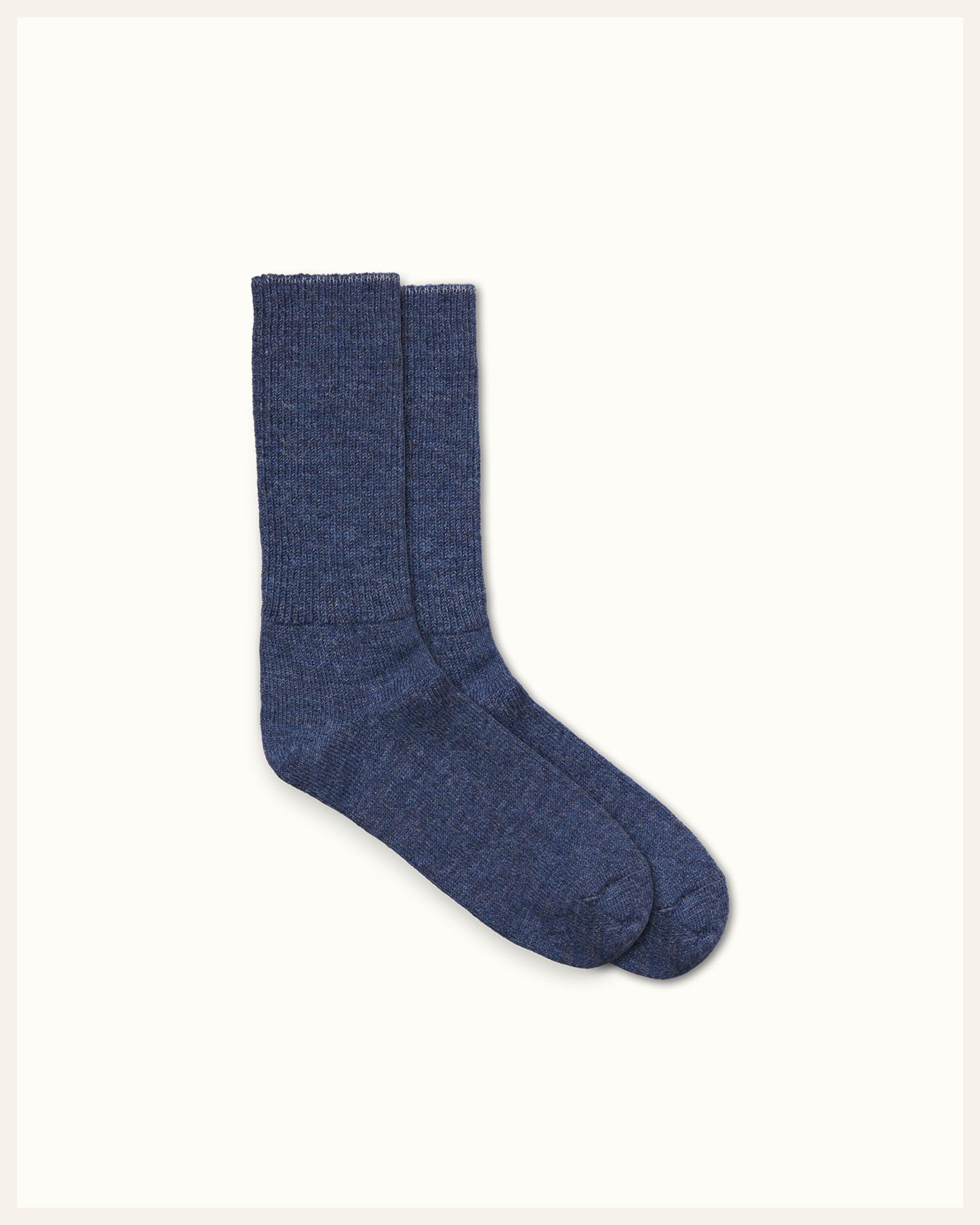 The Beauty Sleeper Blue alpaca bed socks detail — sourced from Peru, knitted in Europe