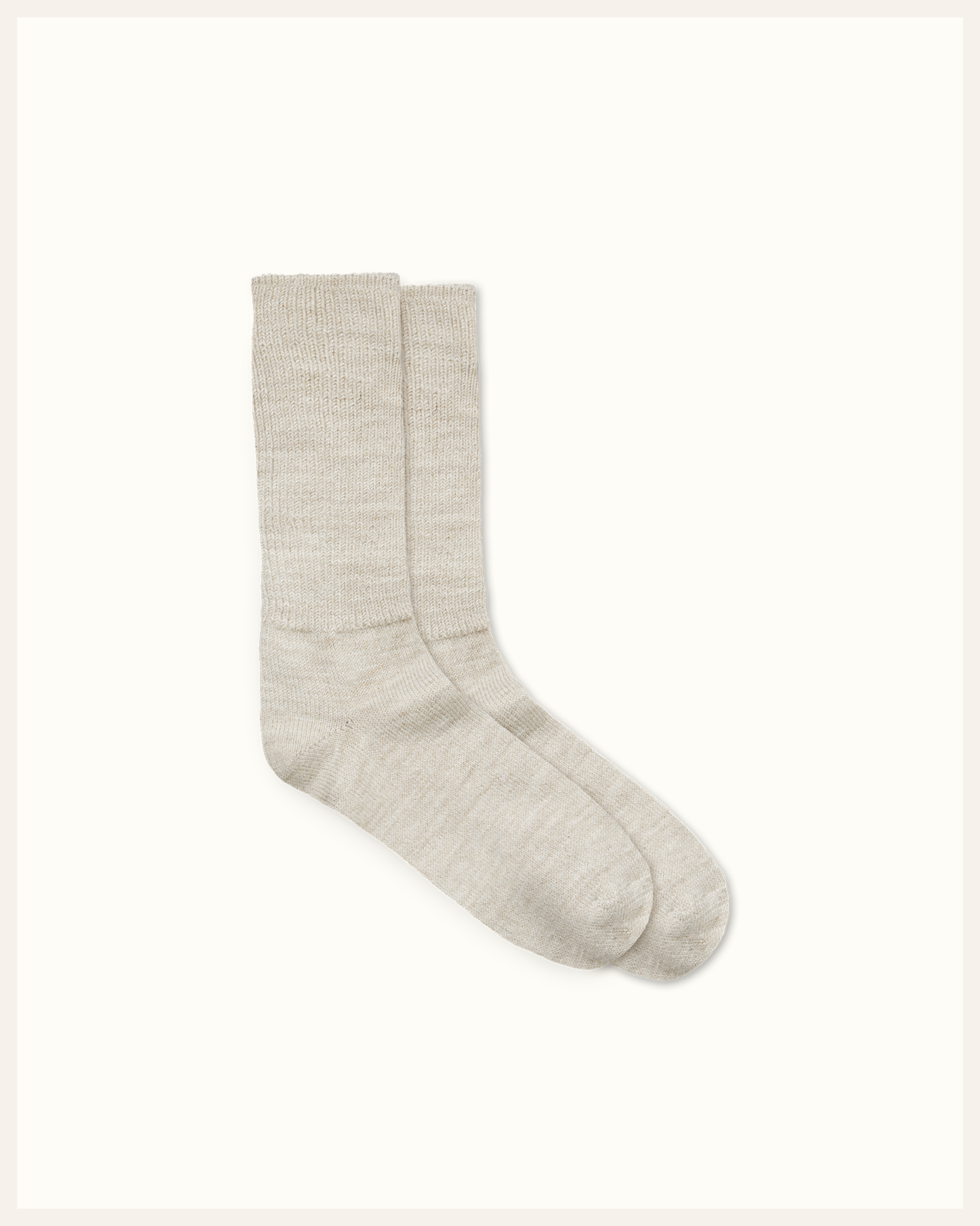 The Beauty Sleeper Sand alpaca bed socks detail — sourced from Peru, knitted in Europe