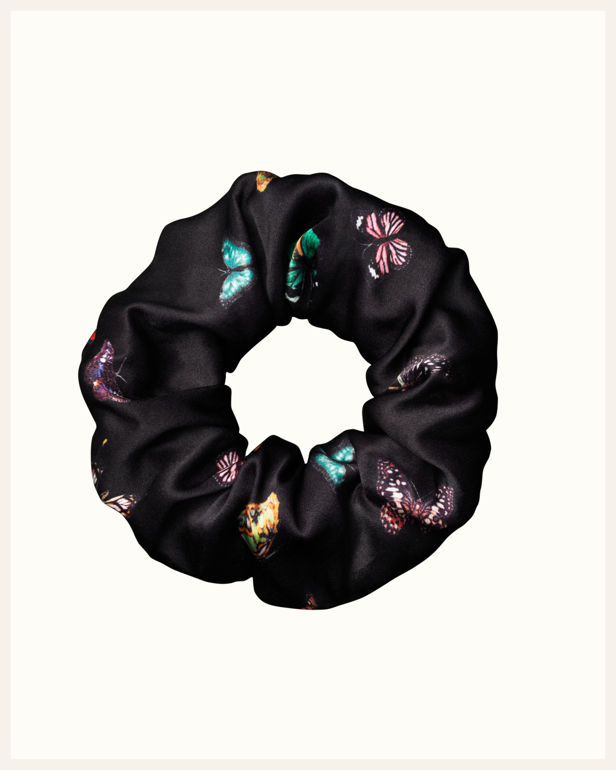 The Beauty Sleeper 100% Mulberry silk hair scrunchie in Columba Black — reduces friction and protects hair overnight