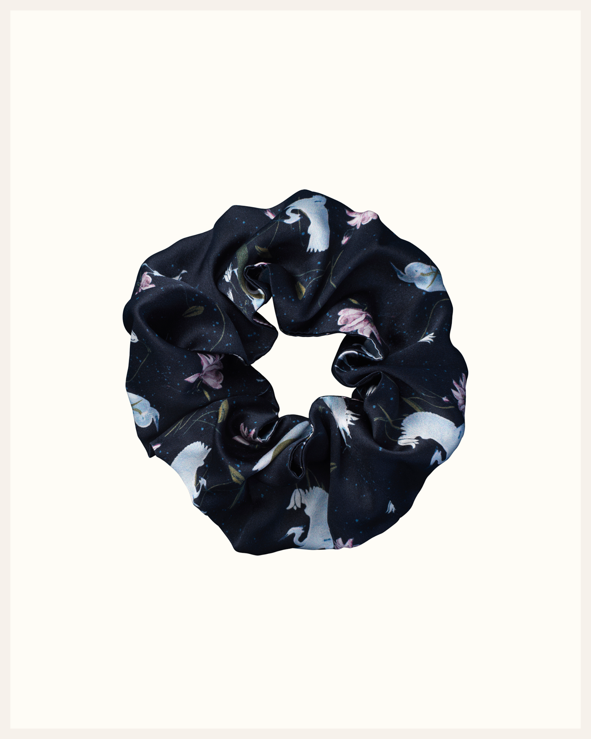 The Beauty Sleeper 100% Mulberry silk hair scrunchie in Leo Black — reduces friction and protects hair overnight
