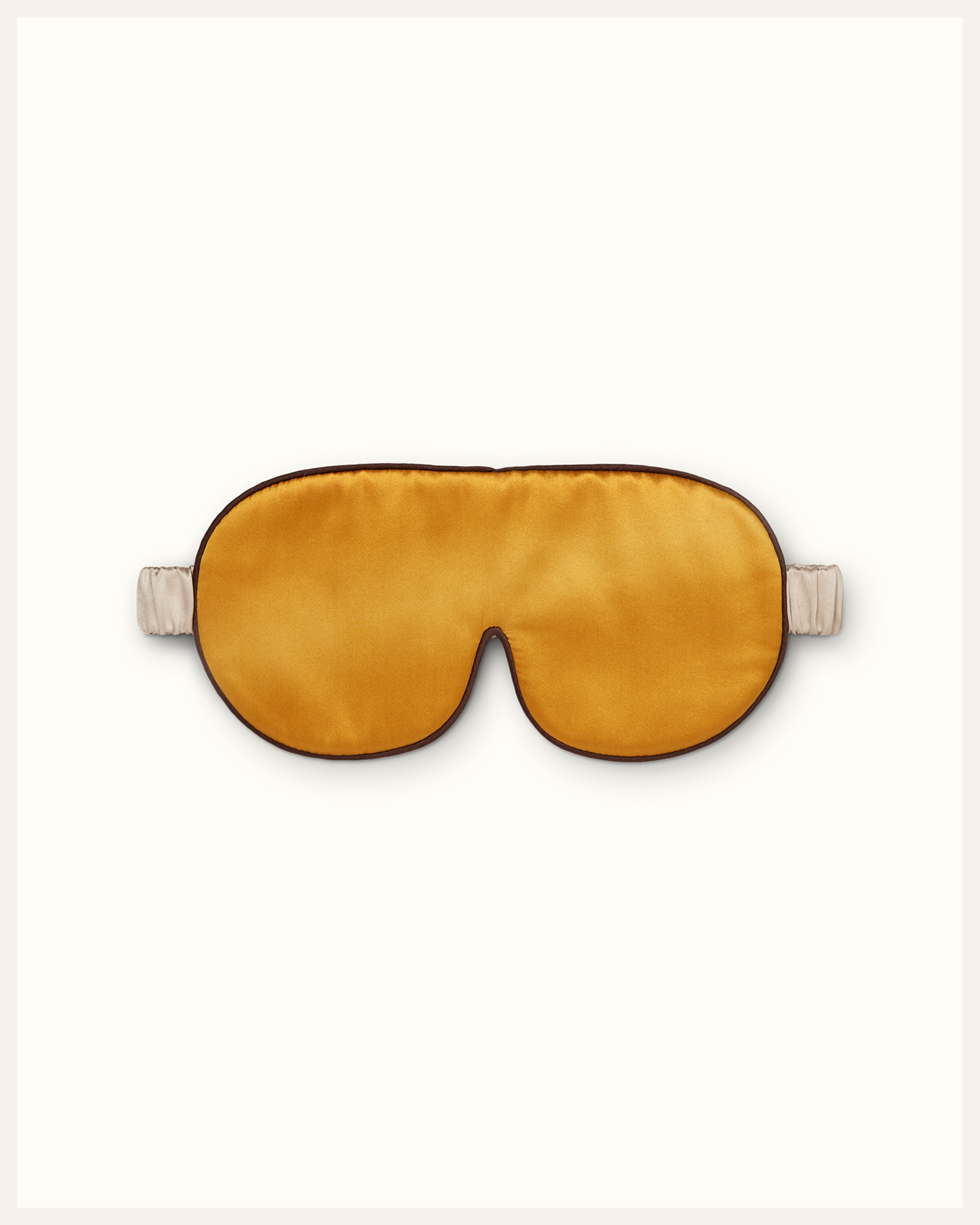The Beauty Sleeper Golden Hour silk sleep mask front view — designed for heavenly slumber