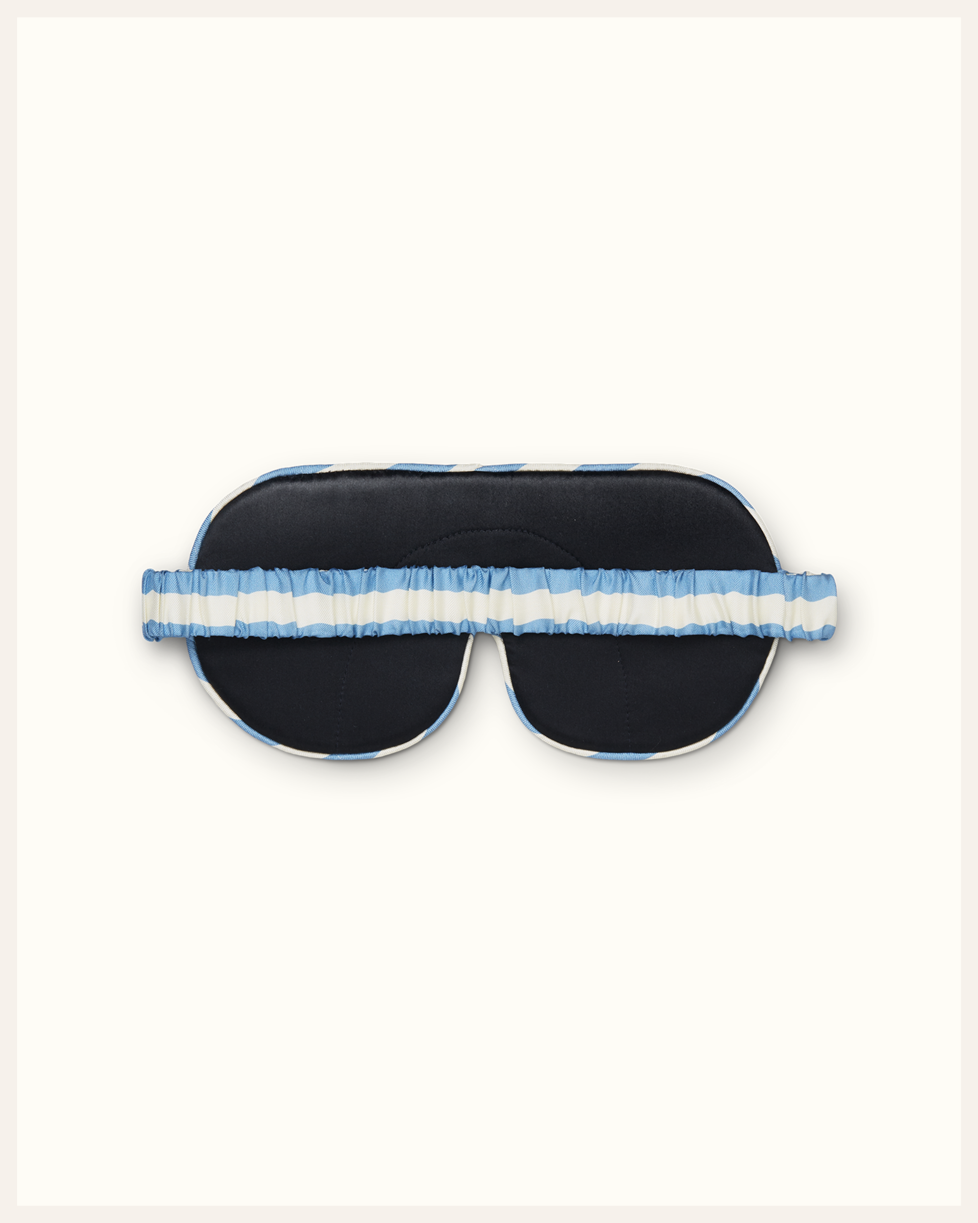 The Beauty Sleeper Pisces Blue Ivory Stripe sleep mask back view — wide silk strap protects hair overnight